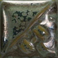 Glossy ceramic glaze sample featuring iridescent gold and teal tones with unique texture, ideal for pottery and sculpture.