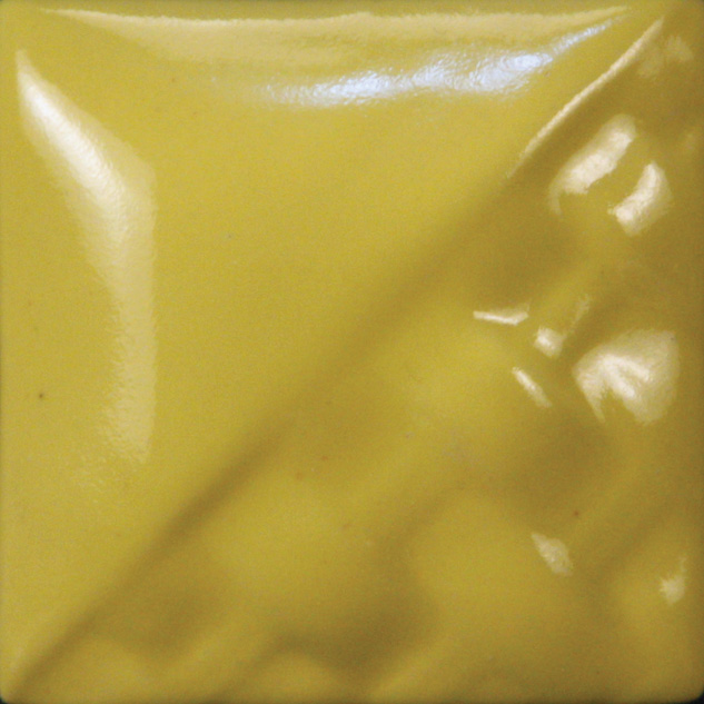 Glossy yellow ceramic glaze sample showcasing vibrant color and smooth texture, ideal for pottery and sculptural projects.