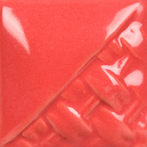 Bright coral pottery glaze sample with a glossy finish and textured diagonal pattern, ideal for ceramic decorating.