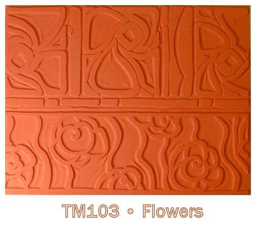 Textured ceramic clay mat featuring floral designs, labeled TM103 Flowers, ideal for pottery decoration and sculpture.