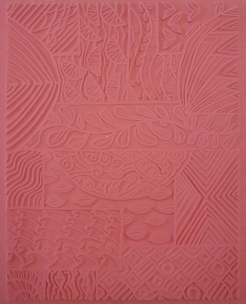 Textured silicone stamping mat featuring intricate leaf, wave, and geometric patterns for pottery decorating techniques.