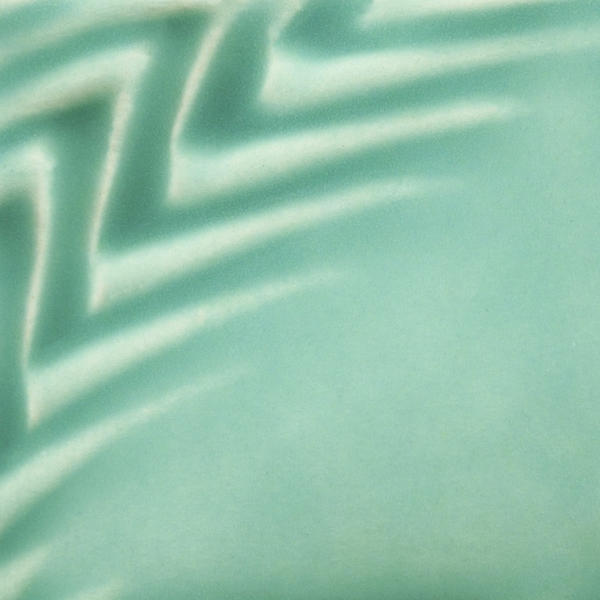 Satin mint green glaze with a smooth finish, ideal for decorative ceramic pieces and pottery enhancements.