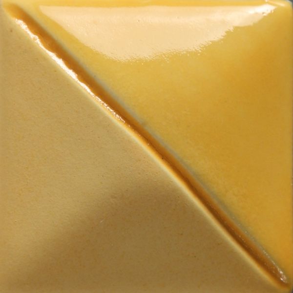 Polished yellow ceramic tile with a glossy glaze, featuring a diagonal split between matte and shiny surfaces.
