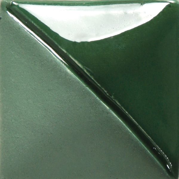 A glossy green and white clay tile showcasing a diagonal separation of glazes, ideal for ceramic projects and color sampling.