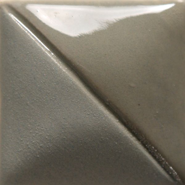 A close-up of a ceramic tile featuring a speckled gray glaze with a glossy finish, showcasing texture and color.