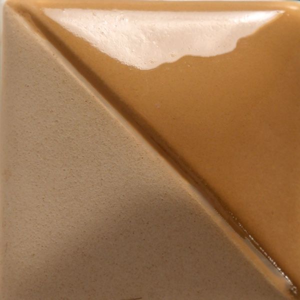 Ceramic color sample featuring a split glaze with a glossy amber finish and a matte beige surface.