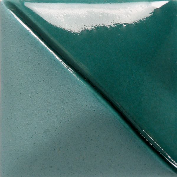 Teal ceramic glaze sample showcasing glossy surface with two color finishes, ideal for pottery decoration and firing.