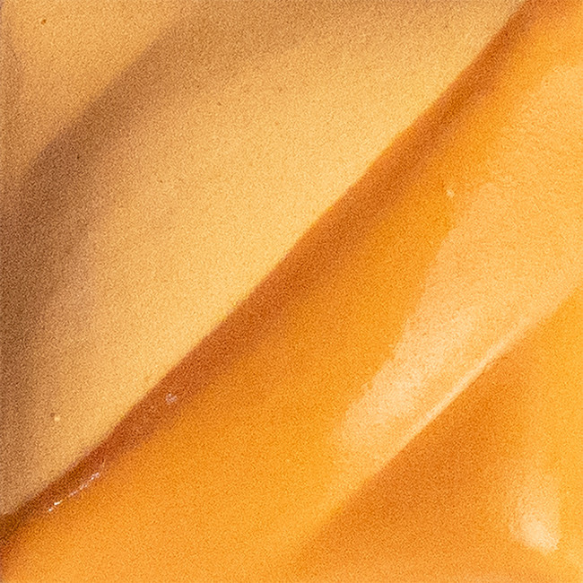 Close-up of a smooth, glossy golden-brown clay glaze, showcasing texture ideal for decorative pottery applications.