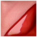 Glossy red ceramic glaze sample, showing smooth texture and vibrant color, ideal for pottery and sculpture projects.