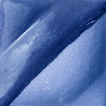 Close-up of a textured blue ceramic glaze sample, showcasing variations in color and sheen, ideal for pottery decoration.