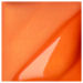 Bright orange ceramic glaze with a glossy finish, ideal for decorative pottery and sculpture.