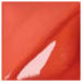 Close-up of a vibrant red ceramic glaze with smooth texture, ideal for decorating pottery and sculptures.
