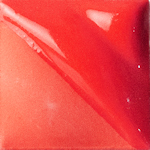 Bright red glossy ceramic glaze sample showcasing smooth texture and vibrant color ideal for pottery decoration.