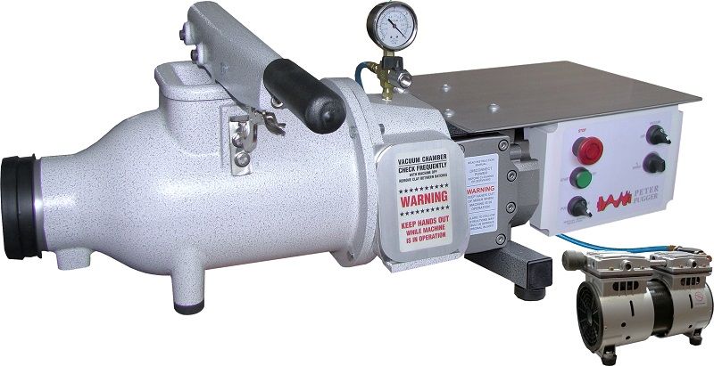 Vacuum deairing pugmill for ceramics with control panel and attached motor, used for clay preparation and processing.