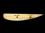 Wooden pottery tool shaped for fine detailing in ceramics, used for smoothing and shaping clay in sculpting projects.
