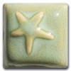 Glossy green ceramic tile featuring a raised starfish design, ideal for decorating pottery or mosaic projects.