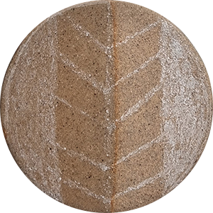Textured round clay ceramic piece with a leaf imprint and glossy glaze, suitable for pottery projects and sculptural decoration.
