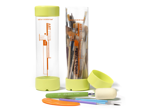 Storage container with ceramic brushes and tools, including a sponge, color detailing tools, and vibrant accents for art use.