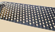 Ceramic ribbed mat for clay shaping, featuring a flexible design with evenly spaced holes for efficient use in pottery.