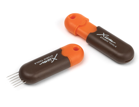 Xiem Studio Tools pottery trimming tool and needle tool, featuring ergonomic grips for precise clay sculpting and decorating.