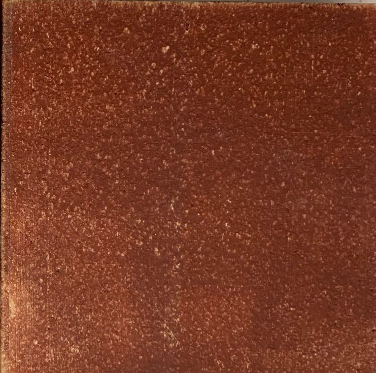 Dark reddish-brown clay color swatch with a textured surface typical for ceramic glazes and pottery applications.