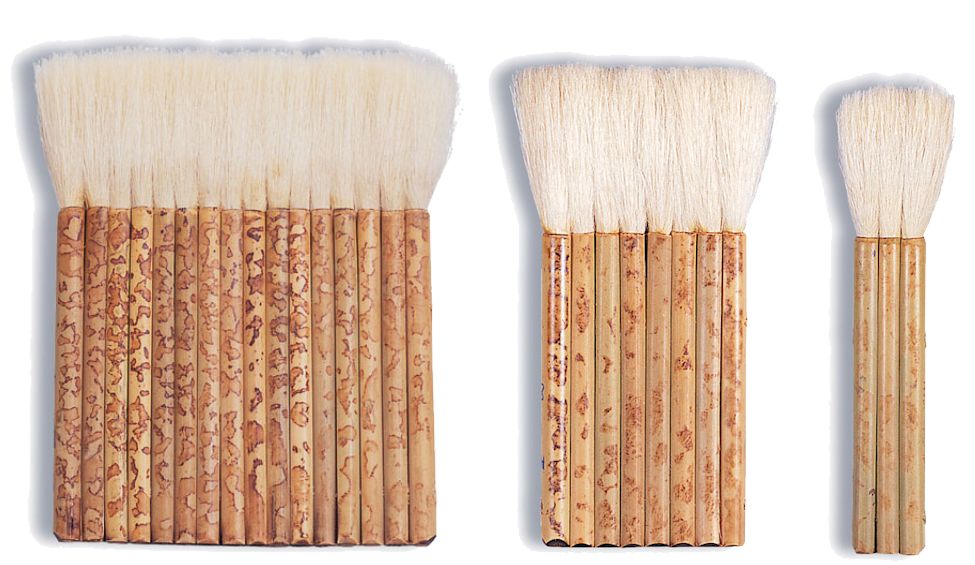 Set of three ceramic brushes with soft bristles, used for glazing and decorating pottery and clay sculptures.