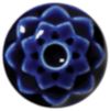 Deep blue ceramic flower-shaped glaze sample with a central hole, showcasing a glossy finish and intricate detailing.