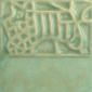 Light green textured clay surface featuring intricate stamped patterns, suitable for pottery decoration or sculpture projects.