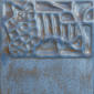 Relief texture in a blue ceramic tile, showcasing abstract patterns and surface design suitable for decorative projects.