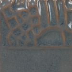 Dark blue ceramic glaze with a glossy finish, showcasing textured patterns, ideal for pottery and decorative projects.