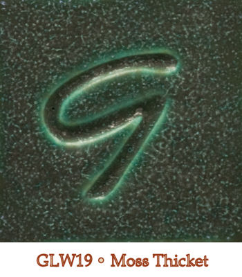 Close-up of GLW19 Moss Thicket glaze sample, featuring a rich green color with a subtle textured surface.