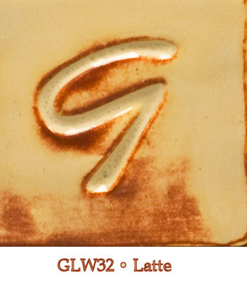 GLW32 Latte glaze sample showing a smooth beige surface with a glossy finish and subtle brown veining.
