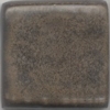 Dark brown ceramic glaze sample with subtle texture, ideal for pottery decoration and firing applications.