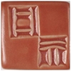 Square ceramic tile with a reddish-brown glaze, featuring embossed designs of lines and shapes, ideal for decorative applications.