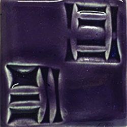 Dark purple ceramic tile displaying textured geometric patterns, ideal for decorative pottery and sculptural projects.