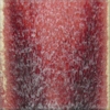 Granite Red glaze sample showing a gradient of deep red to black, ideal for pottery and sculptural decoration.