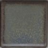 Dark clay glaze sample showcasing a textured surface with subtle shimmer, ideal for pottery and ceramic decorative finishes.