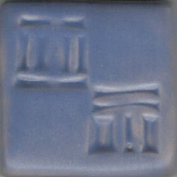 Matte blue glaze sample tile featuring subtle surface textures and patterns, ideal for pottery and ceramic projects.