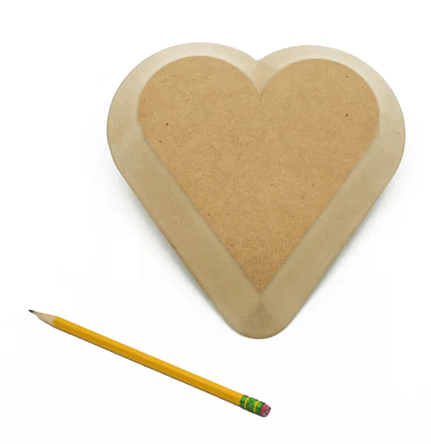 Heart-shaped ceramic slab with a smooth surface, paired with a yellow pencil for sketching designs.