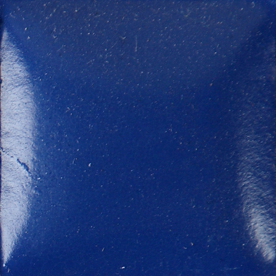 Vibrant blue ceramic glaze sample, smooth with a glossy finish, showcasing rich color for pottery decoration and design.