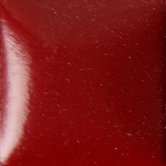 Deep red ceramic glaze sample with a glossy finish, showcasing texture suitable for pottery and sculpture decoration.