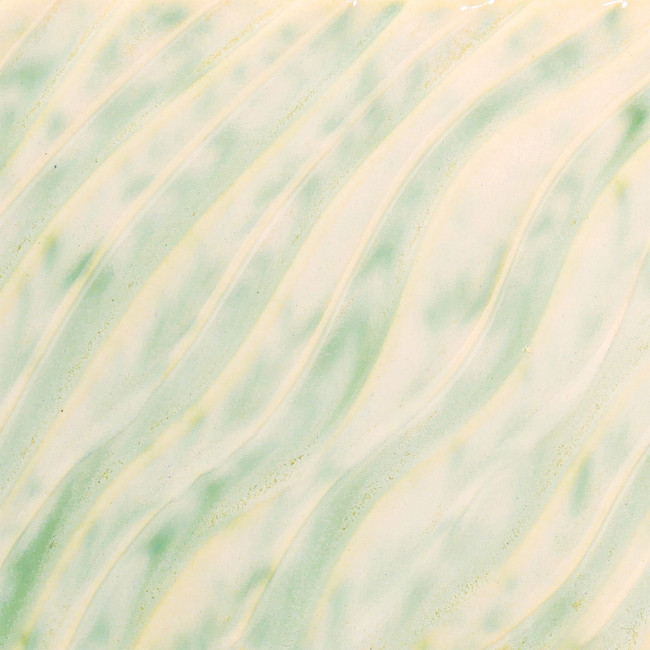 Smooth ceramic surface featuring soft green and white wavy patterns, ideal for glazes or decorative pottery techniques.