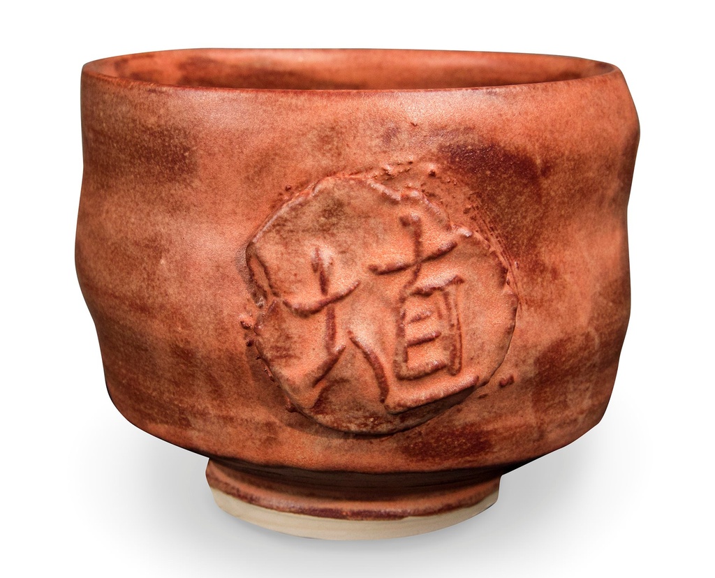 Ceramic tea bowl with embossed characters, featuring a rich reddish-brown clay body and smooth rim, ideal for functional pottery.