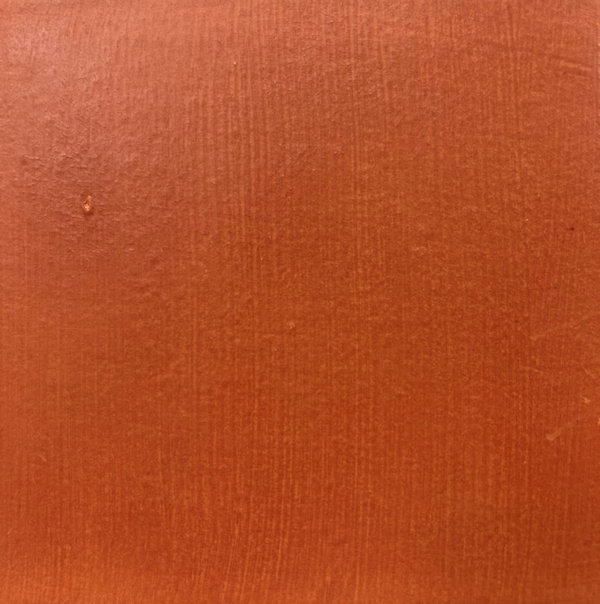 Rich terracotta clay swatch showcasing a smooth, warm reddish-brown surface ideal for pottery and sculpting projects.