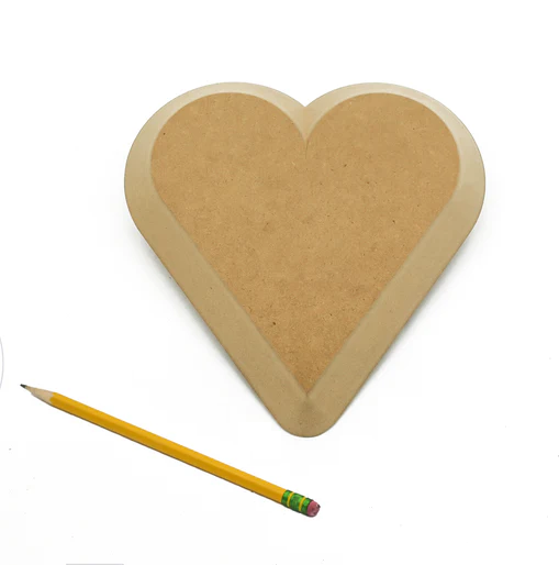 Heart-shaped ceramic mold in natural color, beside a yellow pencil, for pottery and sculpting projects at Georgies Ceramic & Clay Company.