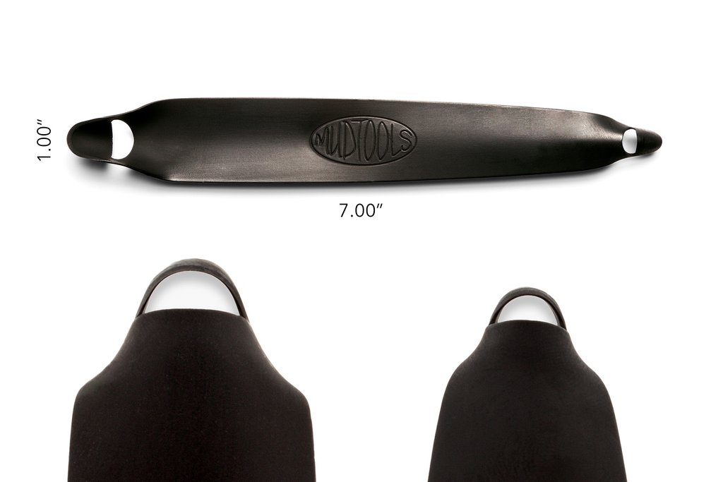 Mudtools black rib measuring 1 by 7, ideal for smoothing and shaping clay in pottery and ceramics.