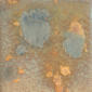 Ceramic color swatch featuring a mix of earthy tones with blue and orange accents, ideal for glazing pottery.