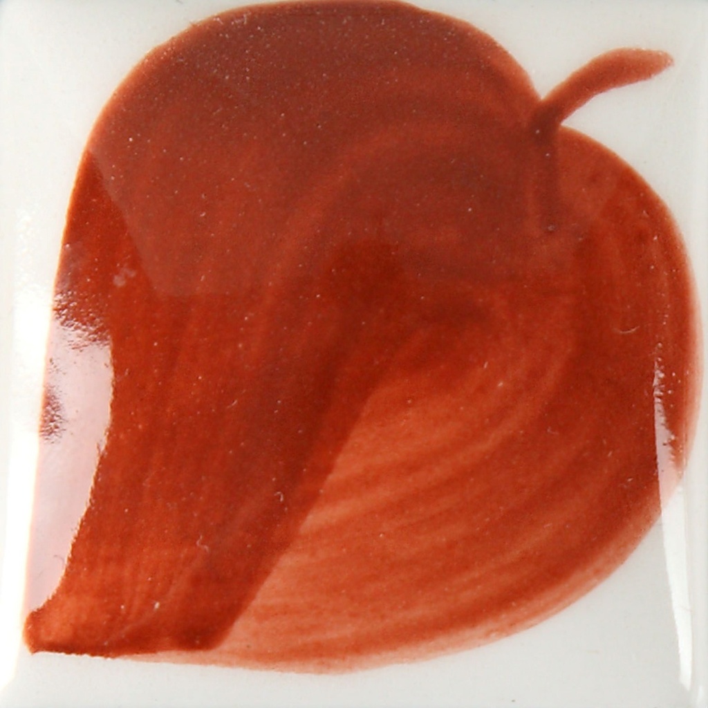 Swatch of a reddish-brown glaze applied to a white ceramic tile, showcasing a smooth, glossy finish for pottery decoration.