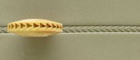 Ceramic tool displaying intricate texture, used for decorating clay surfaces in pottery and sculpture creation.