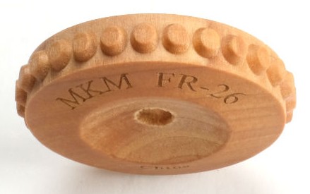 Wooden pottery tool MKM FR-26, featuring a textured edge for creating decorative patterns in clay or ceramic pieces.